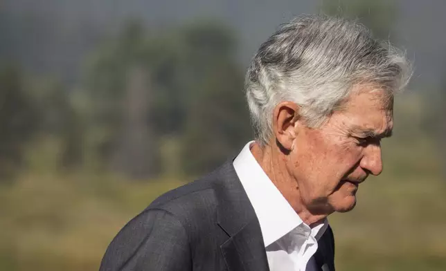 FILE - Federal Reserve Chair Jerome Powell walks outside of the Jackson Hole Economic Symposium at Jackson Lake Lodge in Grand Teton National Park near Moran, Wyo., on Aug. 23, 2024. (AP Photo Amber Baesler, File)