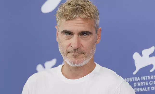 FILE - Joaquin Phoenix appears at the photo call for the film "Joker: Folie A Deux" during the 81st edition of the Venice Film Festival in Venice, Italy, on Sept. 4, 2024. (Photo by Vianney Le Caer/Invision/AP, File)