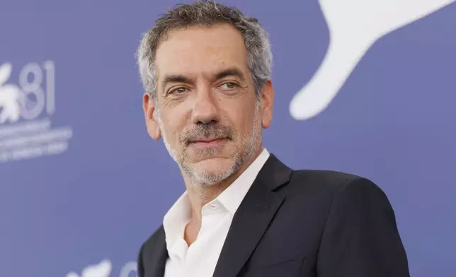 FILE - Director Todd Phillips appears at the photo call for the film "Joker: Folie A Deux" during the 81st edition of the Venice Film Festival in Venice, Italy, on Sept. 4, 2024. (Photo by Vianney Le Caer/Invision/AP, File)