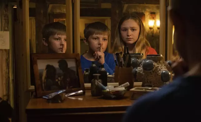 This image released by Universal Pictures shows Dan Hough, left, and Alix West Lefler in a scene from "Speak No Evil." (Universal Pictures via AP)