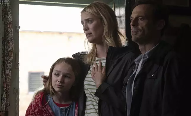 This image released by Universal Pictures shows, from left, Alix West Lefler, Mackenzie Davis and Scoot McNairy in a scene from "Speak No Evil." (Universal Pictures via AP)