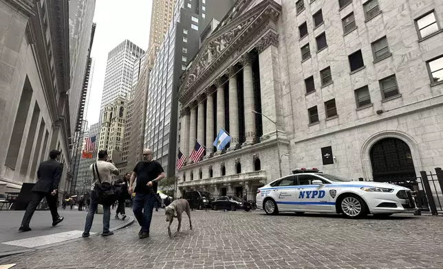 The flag of Argentina flies on the front of the New York Stock Exchange where Argentine President Javier Milei will ring the opening bell on Monday, Sept. 23, 2024, in New York. (AP Photo/Peter Morgan)