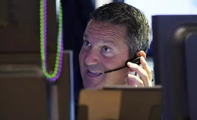 Trader Leon Montana works on the floor of the New York Stock Exchange, Wednesday, Sept. 18, 2024. (AP Photo/Richard Drew)