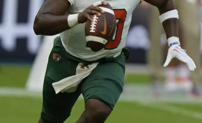 Florida A&amp;M quarterback Daniel Richardson (10) looks to pass during the first half of an NCAA football game against Miami, Saturday, Sept. 7, 2024, in Miami Gardens, Fla. (AP Photo/Lynne Sladky)