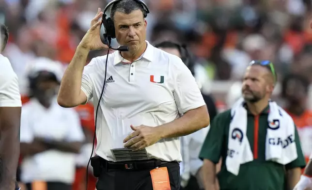 Miami head coach Mario Cristobal watches from the sideline during the first half of an NCAA football game against Florida A&amp;M, Saturday, Sept. 7, 2024, in Miami Gardens, Fla. (AP Photo/Lynne Sladky)