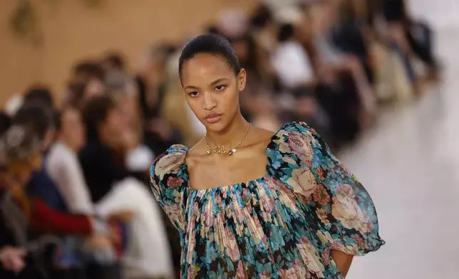 A model wears a creation as part of the Chloe Spring/Summer 2025 collection presented Thursday, Sept. 26, 2024, in Paris. (Photo by Vianney Le Caer/Invision/AP)