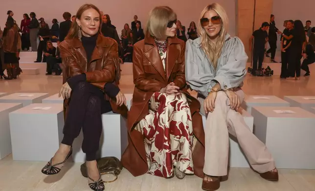 Diane Kruger, from left, Anna Wintour and Sienna Miller attend the Chloe Spring/Summer 2025 collection presented Thursday, Sept. 26, 2024, in Paris. (Photo by Vianney Le Caer/Invision/AP)