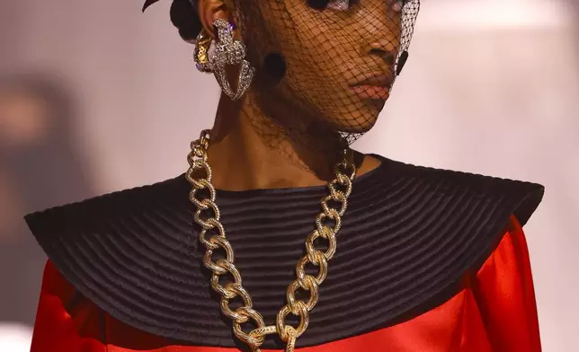 A model wears a creation as part of the Valentino Spring/Summer 2025 collection presented Sunday, Sept. 29, 2024 in Paris. (Photo by Vianney Le Caer/Invision/AP)