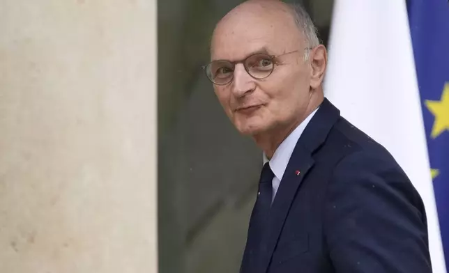 New Justice Minister Didier Migaud, arrives to the first weekly cabinet meeting at the Elysee Palace Monday, Sept. 23, 2024 in Paris. (AP Photo/Christophe Ena)
