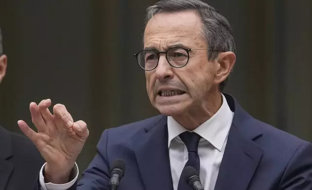 New French Interior Minister Bruno Retailleau, gestures as he delivers a speech during the handover ceremony at the ministry, Monday, Sept. 23, 2024 in Paris. (AP Photo/Christophe Ena)