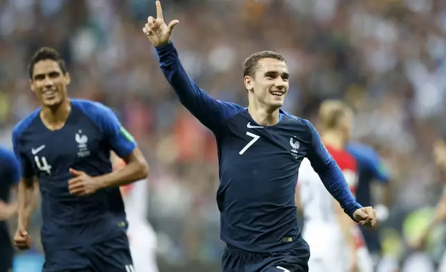 FILE - France's Antoine Griezmann celebrates after scoring on a penalty his side' second goal during the final match between France and Croatia at the 2018 soccer World Cup in the Luzhniki Stadium in Moscow, Russia, Sunday, July 15, 2018. (AP Photo/Matthias Schrader, File)