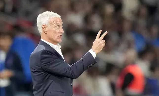 France head coach Didier Deschamps gestures during the UEFA Nations League soccer match between France and Italy at the Parc des Princes in Paris, Friday, Sept. 6, 2024. (AP Photo/Michel Euler)