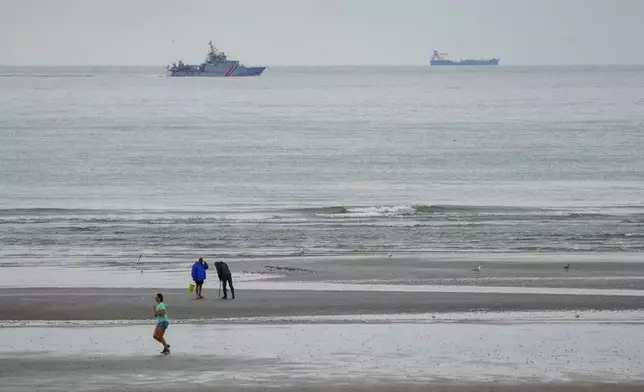 FILE - A vessel of the French Gendarmerie Nationale patrols in front of the Wimereux beach, France, Wednesday, Sept. 4, 2024. (AP Photo/Nicholas Garriga, File)