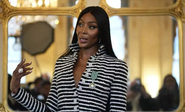 Naomi Campbell delivers a speech after being awarded with the medal of "Chevalier de l'Ordres des Arts et des Lettres", at the Culture ministry, in Paris, Thursday, Sept. 26, 2024. (AP Photo/Louise Delmotte)