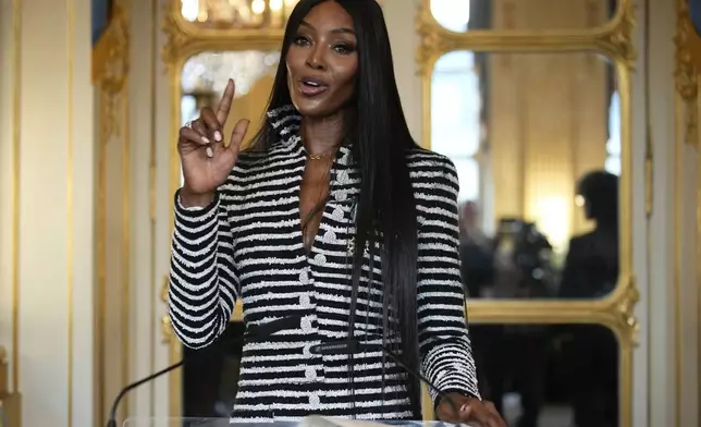 Naomi Campbell delivers a speech after being awarded with the medal of "Chevalier de l'Ordres des Arts et des Lettres", at the Culture ministry, in Paris, Thursday, Sept. 26, 2024. (AP Photo/Louise Delmotte)