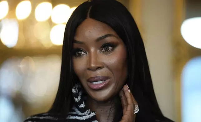 Naomi Campbell delivers a speech after being awarded with the medal of "Chevalier de l'Ordres des Arts et des Lettres", at the Culture ministry, in Paris, Thursday, Sept. 26, 2024. (AP Photo/Louise Delmotte)