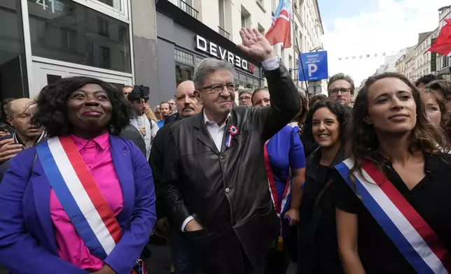 France Unbowed leader Jean-Luc Melenchon, center, who criticized as a power grab the president's appointment of a conservative new prime minister, Michel Barnier, participates in a protest demonstration in Paris, France, Saturday, Sept. 7, 2024. (AP Photo/Michel Euler)