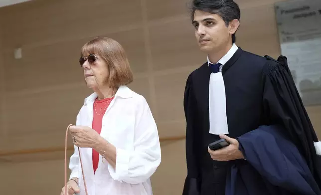 FILE - Gisele Pelicot, left, arrives in the Avignon court house, in Avignon, southern France, Thursday, Sept. 5, 2024. (AP Photo/Lewis Joly, File)