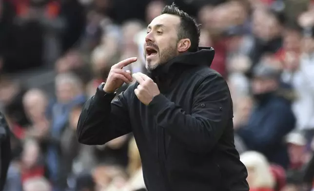FILE - Brighton's head coach Roberto De Zerbi shouts to his players from the sideline during the English Premier League soccer match between Liverpool and Brighton and Hove at Anfield Stadium in Liverpool, England, on March 31, 2024. (AP Photo/Rui Vieira)