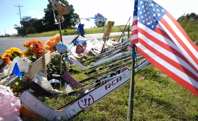 Shown is a makeshift memorial for NHL hockey player Johnny Gaudreau and his brother Matthew who were killed by a suspected drunken driver as they bicycled on a rural road, Sept. 5, 2024, in Oldmans Township , N.J., Thursday. (AP Photo/Matt Rourke)