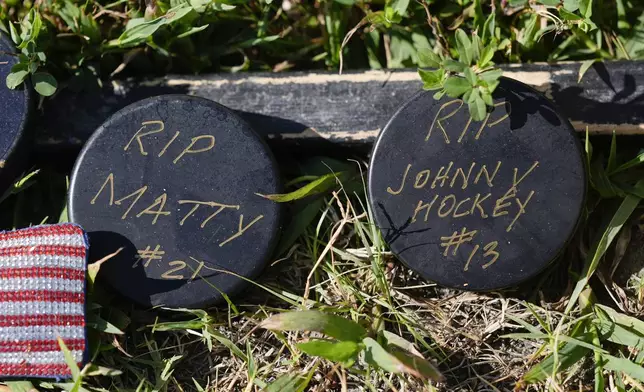 Shown is a makeshift memorial for NHL hockey player Johnny Gaudreau and his brother Matthew who were killed by a suspected drunken driver as they bicycled on a rural road, Sept. 5, 2024, in Oldmans Township , N.J., Thursday. (AP Photo/Matt Rourke)