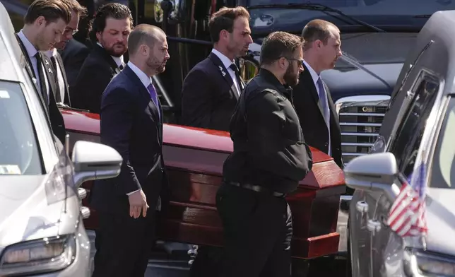 The remains of Matthew Gaudreau arrives for his and his brother Columbus Blue Jackets hockey player John Gaudreau's funeral at St. Mary Magdalen Catholic Church in Media, Pa., Monday, Sept. 9, 2024. (AP Photo/Matt Rourke)