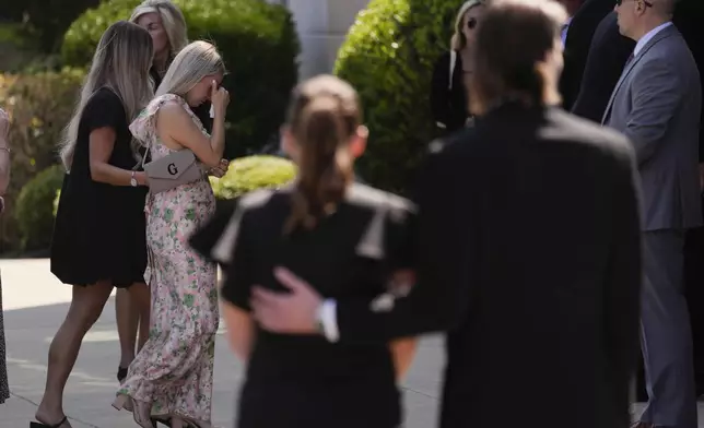 Mourners arrive for a funeral for Columbus Blue Jackets hockey player John Gaudreau and his brother Matthew Gaudreau at St. Mary Magdalen Catholic Church in Media, Pa., Monday, Sept. 9, 2024. (AP Photo/Matt Rourke)