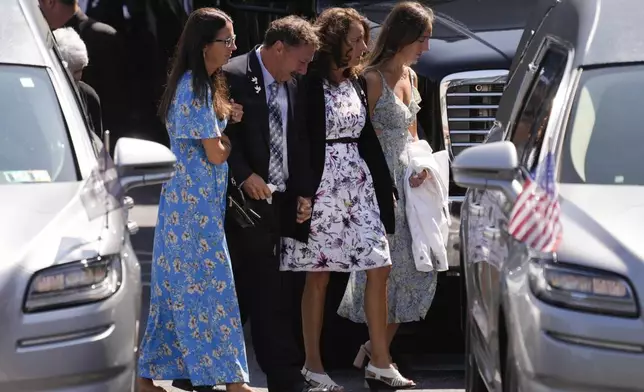 Guy Gaudreau, the father, family and other mourners arrive for a funeral for Columbus Blue Jackets hockey player John Gaudreau Gaudreau and his brother Matthew Gaudreau at St. Mary Magdalen Catholic Church in Media, Pa., Monday, Sept. 9, 2024. (AP Photo/Matt Rourke)