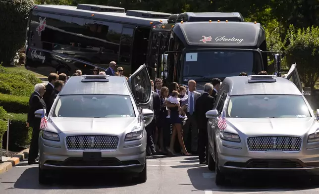 Mourners arrive for a funeral for Columbus Blue Jackets hockey player John Gaudreau and his brother Matthew Gaudreau at St. Mary Magdalen Catholic Church in Media, Pa., Monday, Sept. 9, 2024. (AP Photo/Matt Rourke)