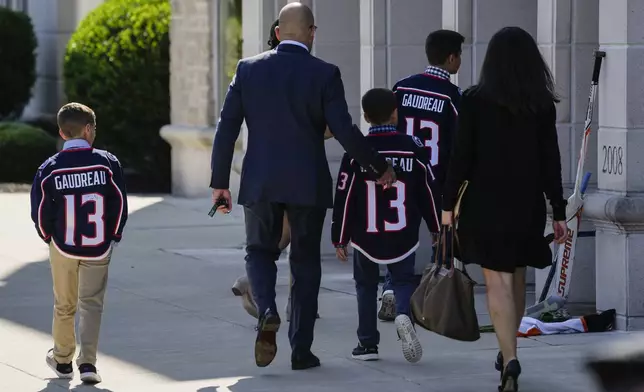 Mourners arrive for a funeral for Columbus Blue Jackets hockey player John Gaudreau and his brother Matthew Gaudreau at St. Mary Magdalen Catholic Church in Media, Pa., Monday, Sept. 9, 2024. (AP Photo/Matt Rourke)