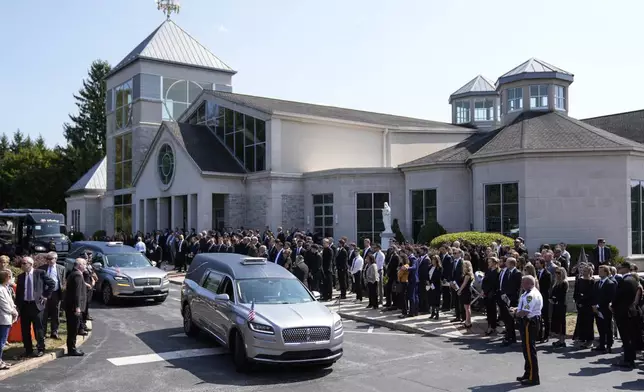 The remains of Columbus Blue Jackets hockey player John Gaudreau and his brother Matthew Gaudreau depart following their funeral at St. Mary Magdalen Catholic Church in Media, Pa., Monday, Sept. 9, 2024. (AP Photo/Matt Rourke)