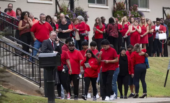 People arrive for the funeral of Apalachee High School shooting victim Mason Schermerhorn in Jefferson, Ga., on Saturday, Sept. 14, 2024. (Ben Gray/Atlanta Journal-Constitution via AP)