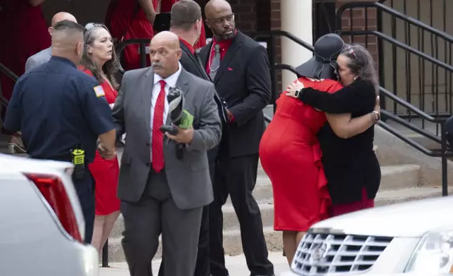 Family members leave after the funeral of Apalachee High School shooting victim Mason Schermerhorn in Jefferson, Ga., on Saturday, Sept. 14, 2024. (Ben Gray/Atlanta Journal-Constitution via AP)