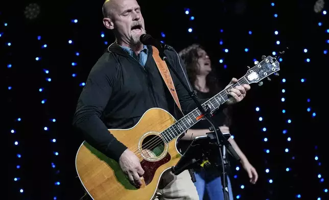 Senior Worship Pastor Joel Goddard sings during a Sunday service at Bethlehem Church, Sunday, Sept. 8, 2024, in Bethlehem, Ga. Grief, pain, hope and faith permeated church services in an Atlanta area community coping with the nation’s latest deadly school shooting. (AP Photo/Mike Stewart)