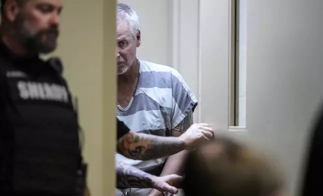 Colin Gray, 54, the father of Apalachee High School shooter Colt Gray, 14, enters the Barrow County courthouse for his first appearance, on Friday, Sept. 6, 2024, in Winder, Ga. (AP Photo/Brynn Anderson)