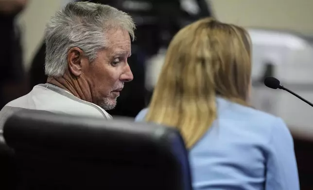 Colin Gray, 54, the father of Apalachee High School shooter Colt Gray, 14, sits in the Barrow County courthouse for his first appearance, on Friday, Sept. 6, 2024, in Winder, Ga. (AP Photo/Brynn Anderson)