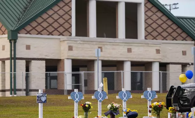 A memorial is seen at Apalachee High School after the Wednesday school shooting, Saturday, Sept. 7, 2024, in Winder, Ga. (AP Photo/Mike Stewart)