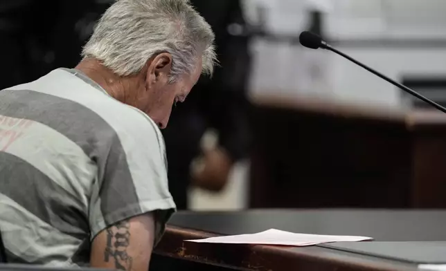 Colin Gray, 54, the father of Apalachee High School shooter Colt Gray, 14, sits in the Barrow County courthouse for his first appearance, on Friday, Sept. 6, 2024, in Winder, Ga. (AP Photo/Brynn Anderson)