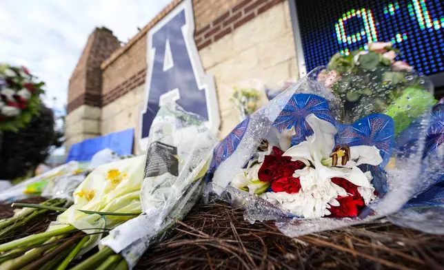 A memorial is seen at Apalachee High School after the Wednesday school shooting, Saturday, Sept. 7, 2024, in Winder, Ga. (AP Photo/Mike Stewart)