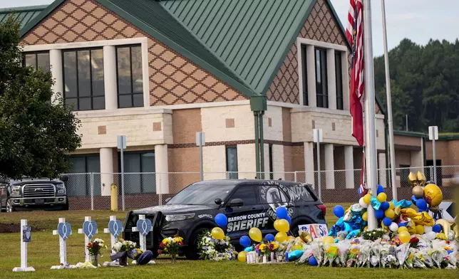 A memorial is seen at Apalachee High School after the Wednesday school shooting, Saturday, Sept. 7, 2024, in Winder, Ga. (AP Photo/Mike Stewart)