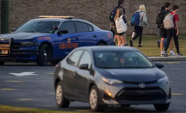 Weeks after a school shooting, students return for classes at Apalachee ...