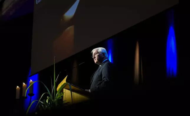 German President Frank-Walter Steinmeier speaks during a commemoration service for the victims of a knife attack that killed three people last week, in Solingen, Germany, Sunday, Sept. 1, 2024. (AP Photo/Michael Probst, Pool)