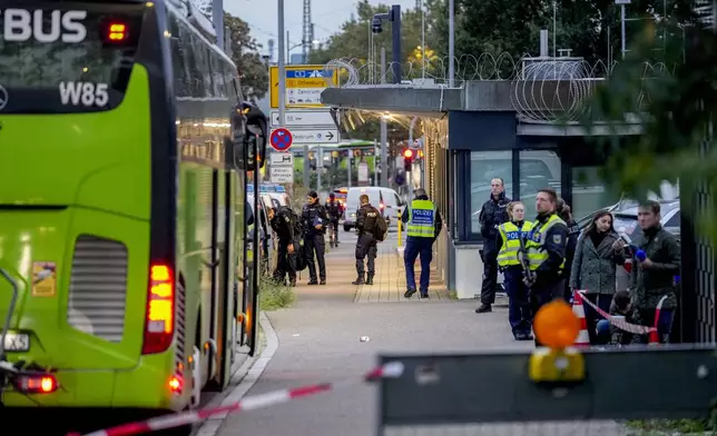 German police officers stop a bus at the border between Germany and France in Kehl, Germany, Monday, Sept. 16, 2024 as Germany controls all his borders from Monday on. (AP Photo/Michael Probst)