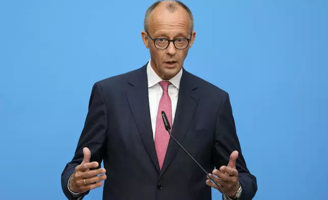 German opposition leader and Christian Democratic Union party chairman Friedrich Merz talks to the media at a joint news conference with Markus Soeder, Christian Social Union party leader and state governor of Bavaria, in Berlin, Germany, Tuesday, Sept. 17, 2024. (AP Photo/Markus Schreiber)