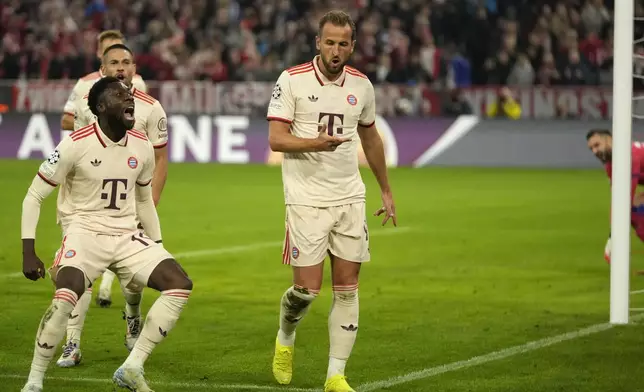 Bayern's Harry Kane, right, celebrates after scoring his sides 4th goal during the Champions League opening phase soccer match between Bayern Munich and GNK Dinamo at the Allianz Arena in Munich, Germany Tuesday, Sept. 17, 2024. (AP Photo/Matthias Schrader)