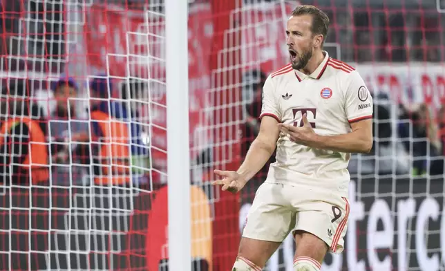 Munich's Harry Kane celebrates after scoring his side's sixth goal during a Champions League opening phase soccer match between FC Bayern Munich and Dinamo Zagreb in Munich, Tuesday, Sept. 17, 2024. (Peter Kneffel/dpa via AP)