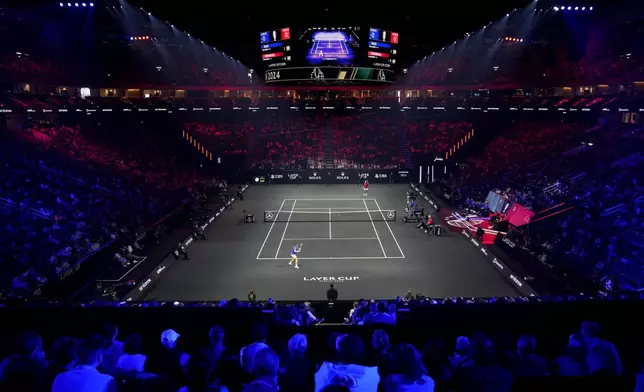 Team Europe's Casper Ruud, bottom, plays against team World's Francisco Cerundolo on the first day of the Laver Cup tennis tournament at the Uber arena in Berlin, Germany, Friday, Sept. 20, 2024. (AP Photo/Ebrahim Noroozi)