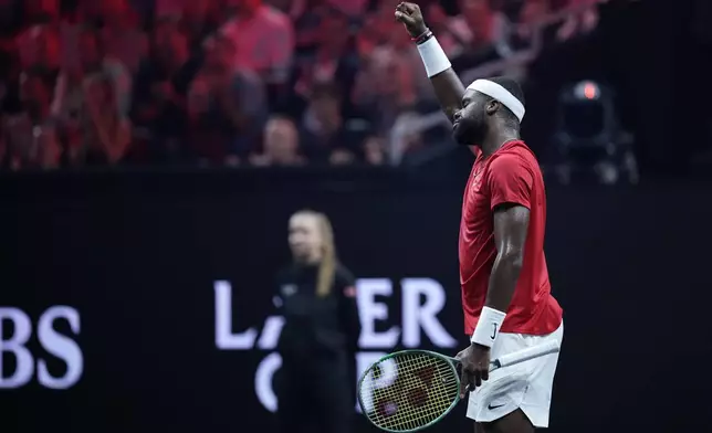 Team World's Frances Tiafoe reacts during a match against Team Europe's Daniil Medvedev on the second day of the Laver Cup tennis tournament at the Uber arena in Berlin, Germany, Saturday, Sept. 21, 2024. (AP Photo/Ebrahim Noroozi)