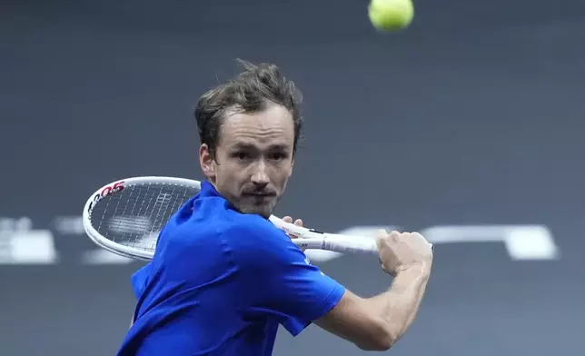 Team Europe's Daniil Medvedev returns to team World's Frances Tiafoe on the second day of the Laver Cup tennis tournament at the Uber arena in Berlin, Germany, Saturday, Sept. 21, 2024. (AP Photo/Ebrahim Noroozi)