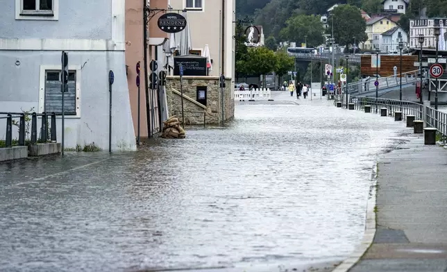 Flooded streets from the Danube River in Passau, Germany, Sunday Sept. 15, 2024. (Armin Weigel/dpa via AP)